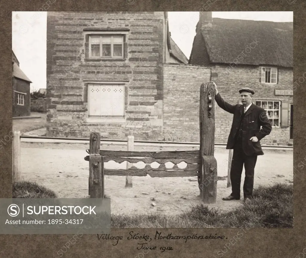 A photograph of a set of stocks in a village in Northamptonshire, taken by Sir John Benjamin Stone (1838-1914), in June, 1912  Sir John Benjamin Stone...