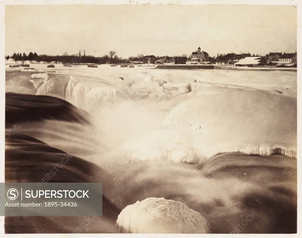 A photograph of the partially-frozen Chaudiere Falls on the Ottawa River in Ontario, Canada, taken by William McFarlane Notman (1826-1891) in 1860 dur...