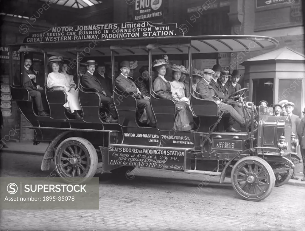 Passengers in a charabanc, Paddington Station, London, about 1907. This vehicle took people on trips around London. These trips were run throughout th...