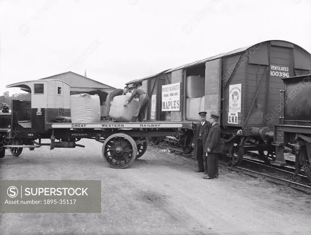 Witney blankets being unloaded from a container, 1923.   Witney in Oxfordshire is famous for its blankets which have been made there since the 12th ce...