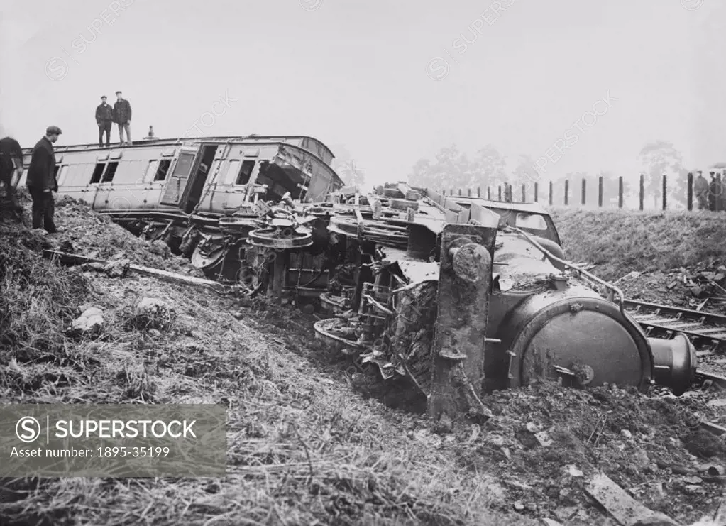 A derailed Great Western Railway locomotive at Henley-in-Arden, Warwickshire, on the line between Stratford-upon-Avon and Birmingham, June 1911.   Thi...