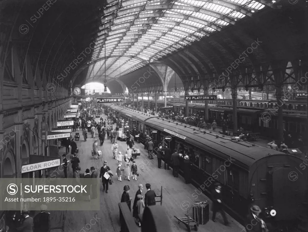Paddington station on Whitsunday, 1927. The platforms are crowded with passengers on excursions.  The railways put on special excursion or holiday tic...