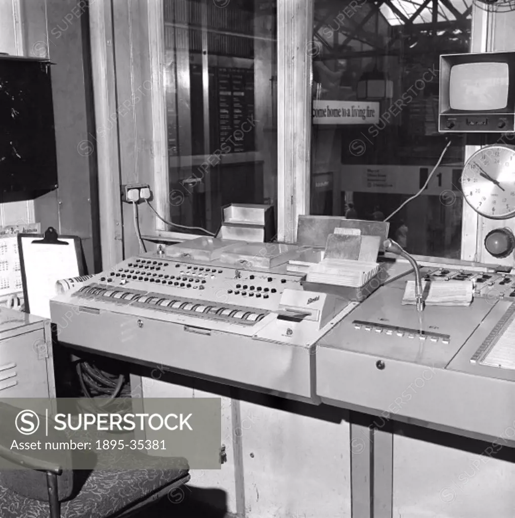 Departure and arrivals board control room at Charing Cross station, London, 26 October 1970. The controls alter the information on the departure board...