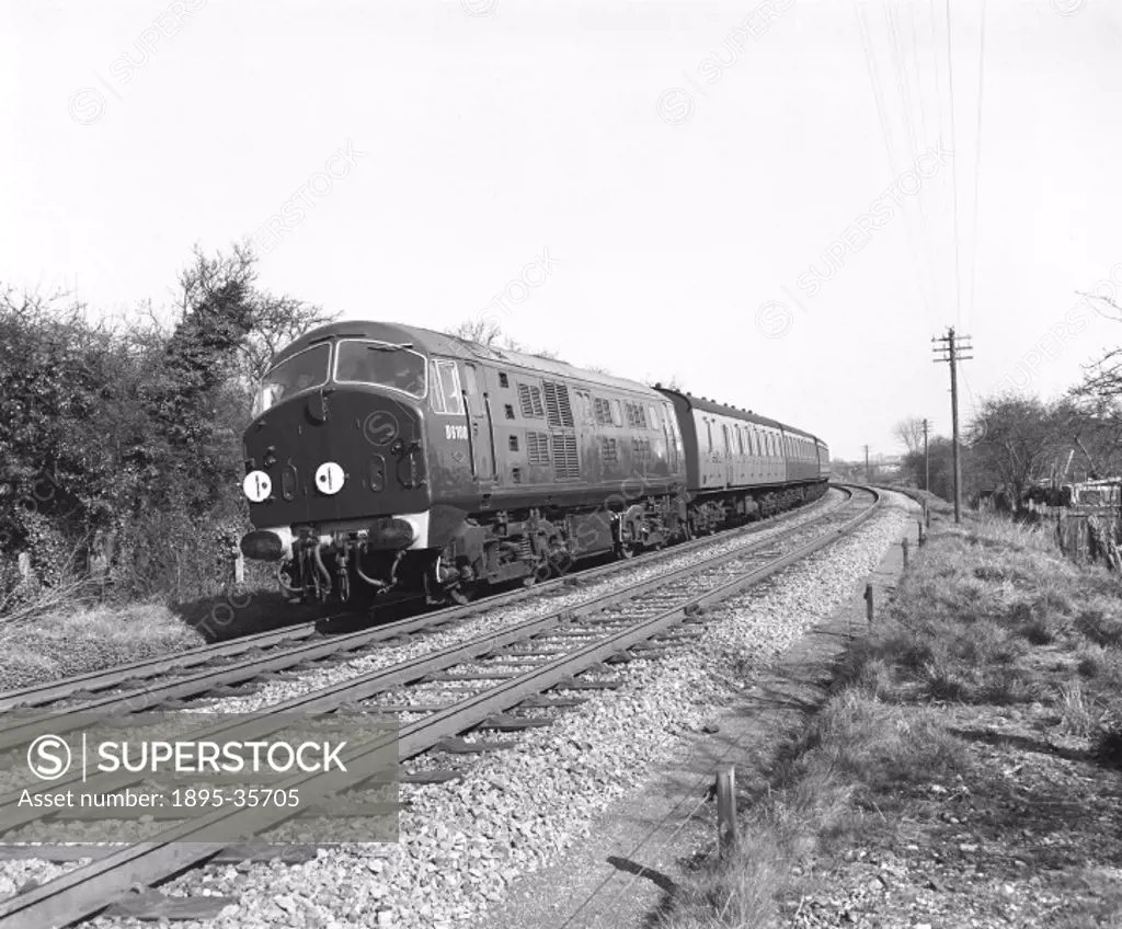 Diesel electric locomotive, number D6100, with a passenger train, 13 March 1959. Diesel engines were becoming more common on British Railways at this ...