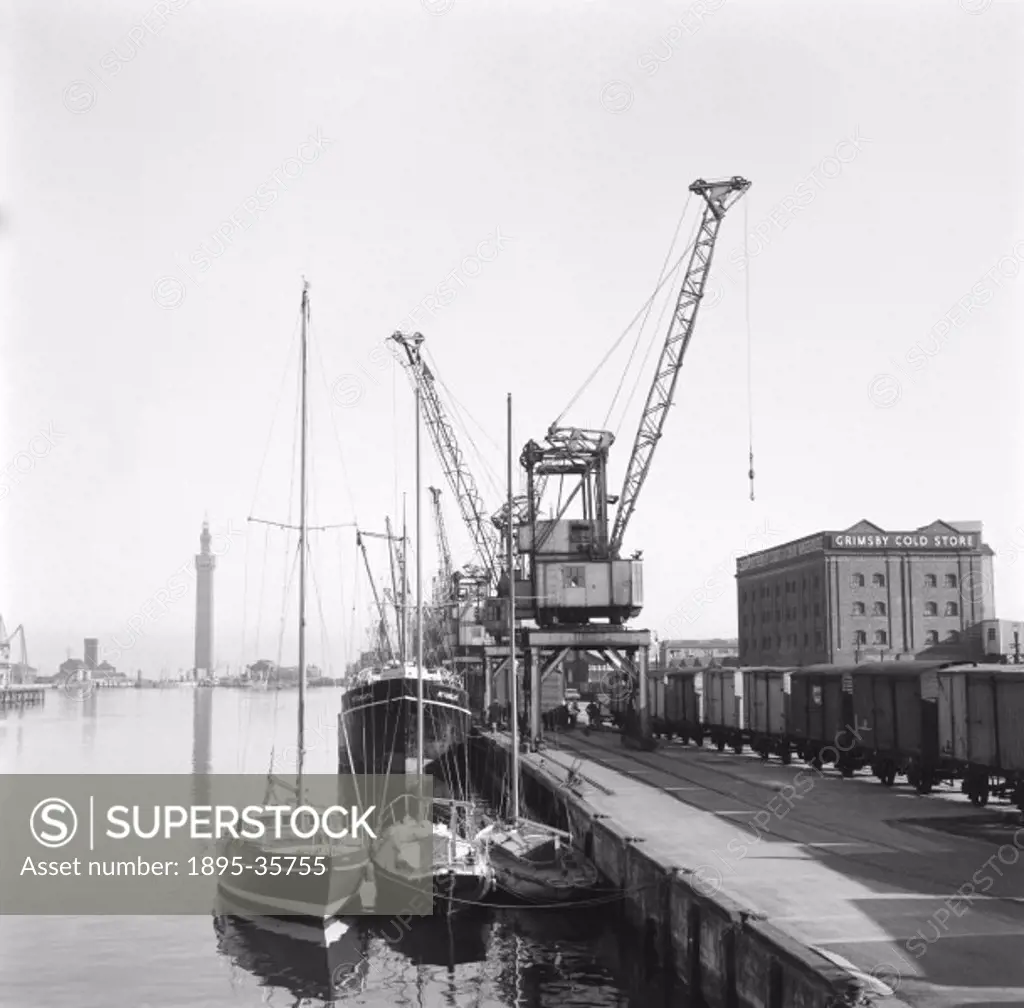 Quay at Grimsby docks, 12 October 1961. Grimsby cold store, to the left of the photograph, was probably used to store fish.  The docks were developed ...