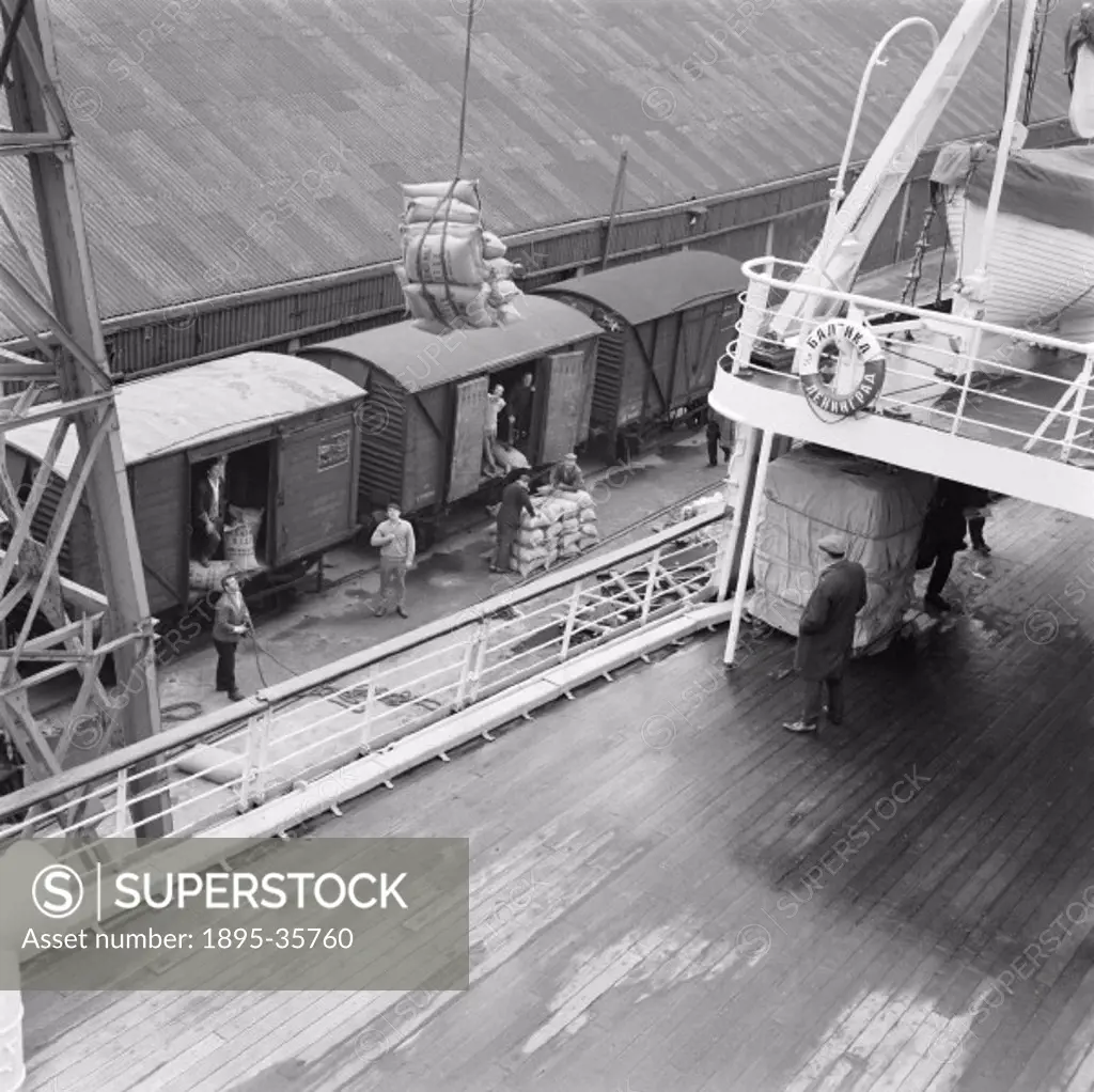 Containers being loaded onto the ´SS Baltica´ at an East Coast port, 3 September 1961. This Russian ship is carrying malt from Stowmarket in Suffolk t...