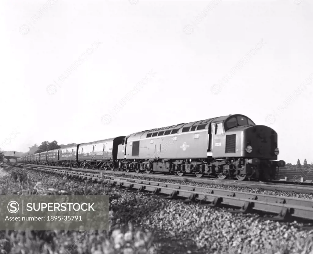 Freight train at New Southgate, London, 26 June 1961. This train carried freight from London up to Newcastle and Edinburgh.   Improved services, toget...