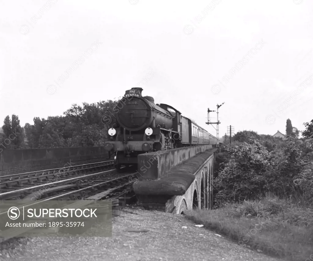The ´Fenman´, pulled by a B1 class 4-6-0 locomotive number 61392 at Audley End station, 22 August 1956.  The ´Fenman´ service took passengers from Hun...