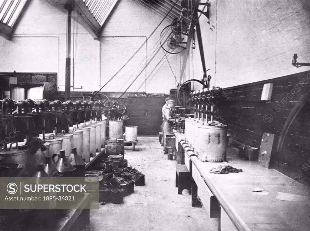 Workers mixing paint at Horwich works, Lancashire, about 1905. This room was used for mixing the paint and for painting the locomotives.   The Lancash...