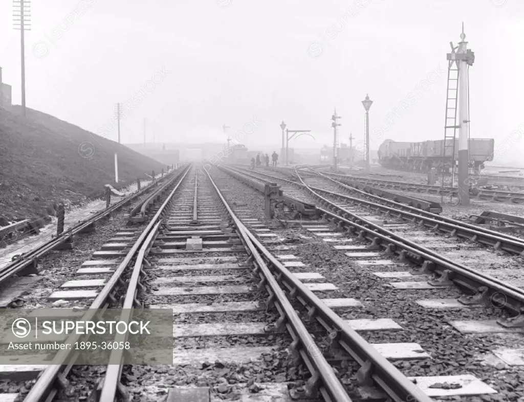 Railway track at Crumpsall, about 1916. Track laying was by small teams who looked after a short section of the line.   Crumpsall, on the Lancashire &...
