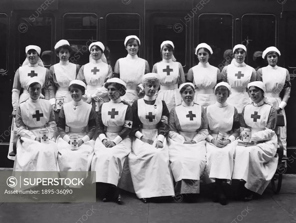 Group of nurses next to an ambulance train at Huddersfield station, West Yorkshire, 1916.  Ambulance trains were used during the First World War in Fr...