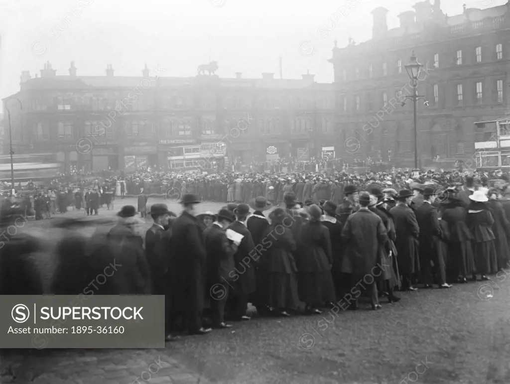 People queueing to see an ambulance train at Huddersfield station, West Yorkshire, 17 November 1917.   This ambulance train was on display at several ...