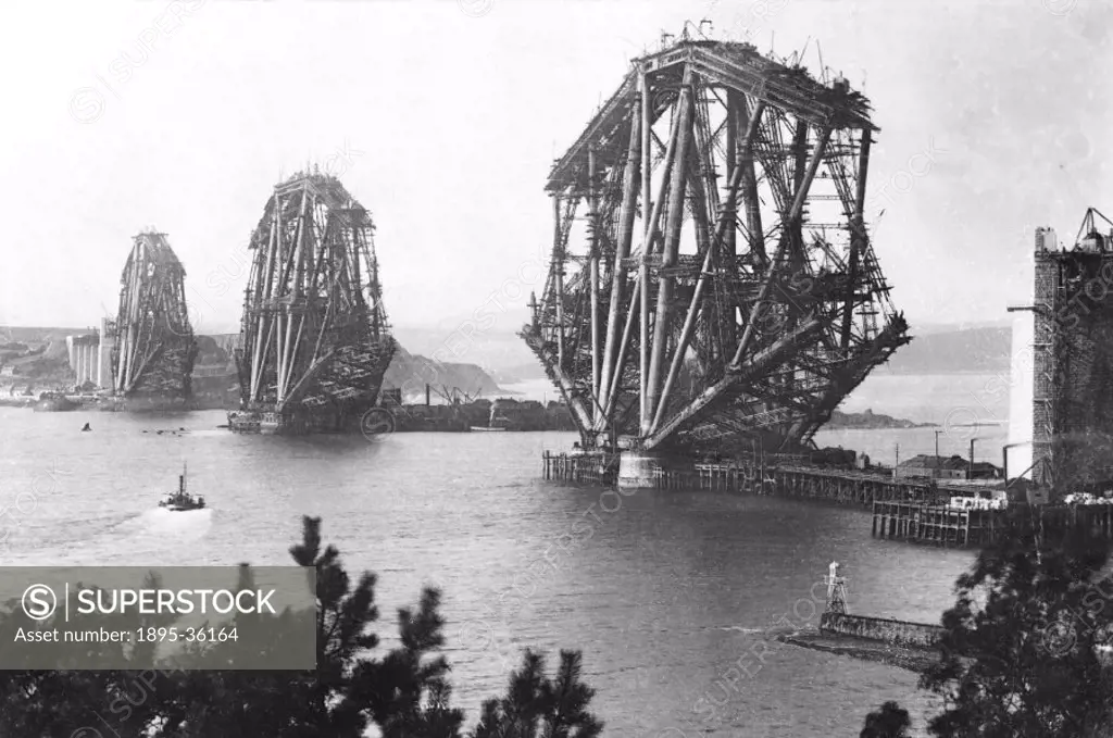 The building of the Forth Bridge, about 1887.   The Forth Bridge, over the Firth of Forth, north of Edinburgh, was built between 1883 and 1890. Before...