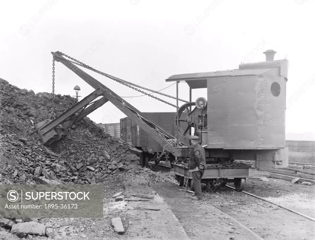 Mechanical coal digger, August 1918.   The railways used coal for many purposes. It was needed to power steam locomotives and railway steam ships, and...