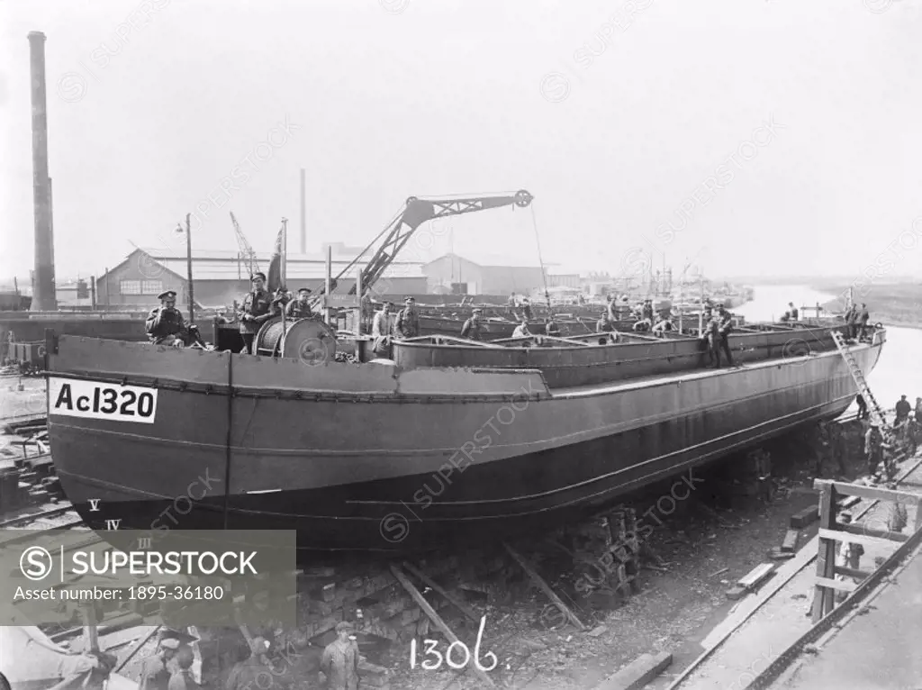 Soldiers on a barge under construction, 19 September 1918.   The Lancashire & Yorkshire Railway had owned boats since 1850. They operated services fro...