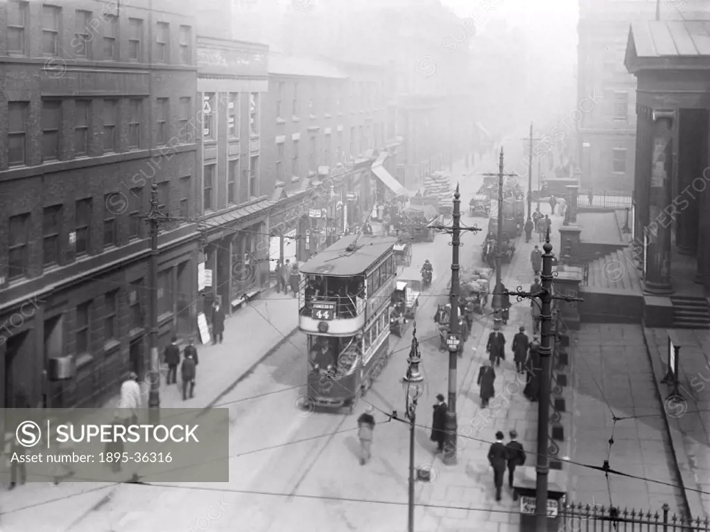 Trams on Mosley Street, Manchester, 15 March 1921.  Trams were first used in Britain in the 1850s in Liverpool. Early trams were pulled by horses alth...