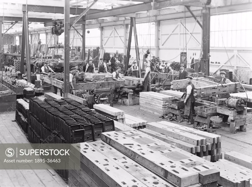 Workers constructing cattle wagons at Earlestown Carriage and Wagon works, 25 June 1926. At this time most wagons were built from wood although timber...