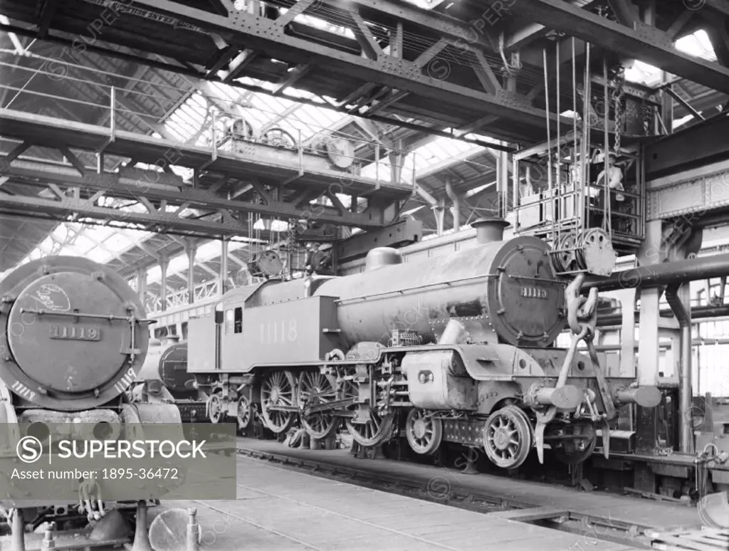 Two class P1 4-6-4 locomotives number 11118 and 11119 in Horwich works erecting shop, 10 August 1926. This shop was where the locomotives were put tog...