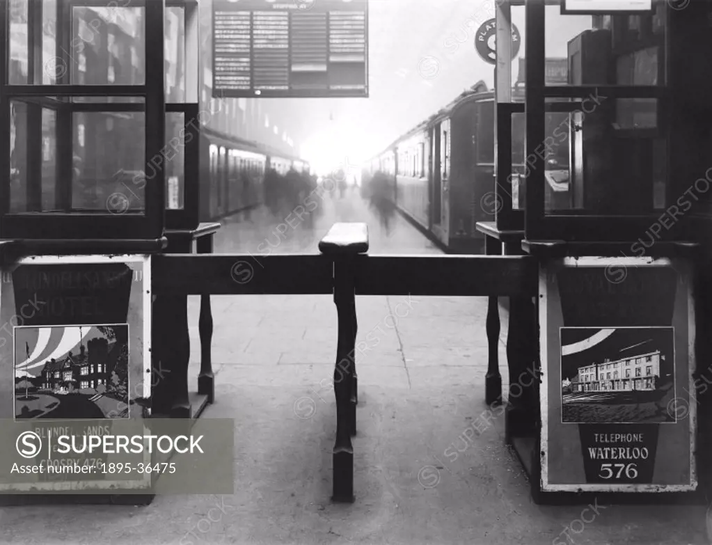 Ticket gate at Liverpool Exchange, 23 February 1927.  At this time all tickets had to be checked on the platform before the passengers were allowed to...