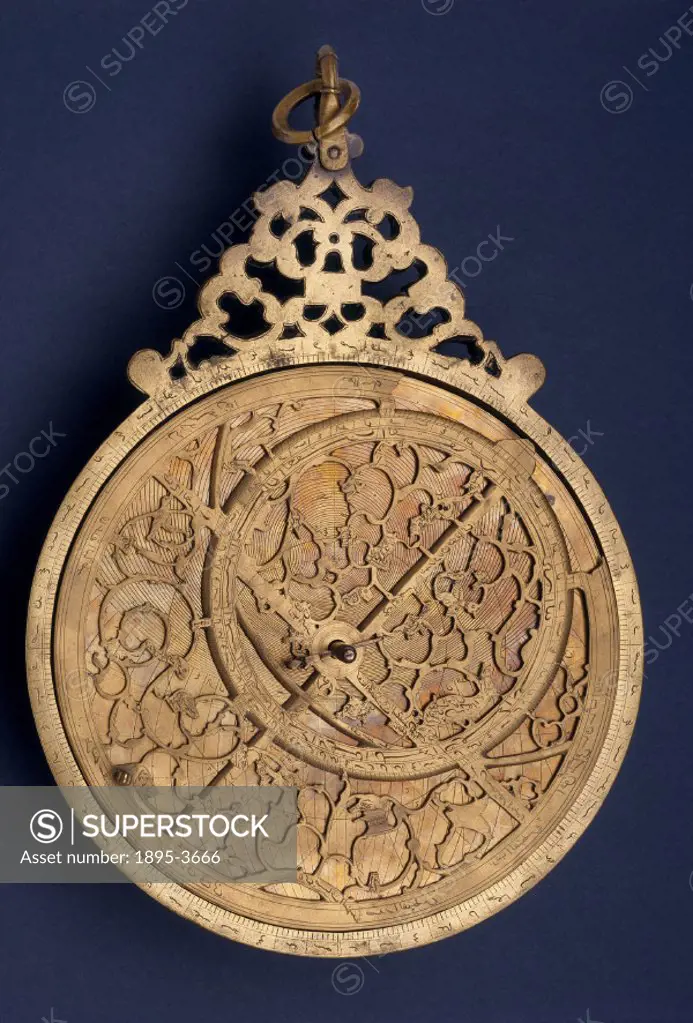 This brass Islamic astrolabe was made by Jamal al-Din at Lahore, Pakistan. An astrolabe is in essence a model of the universe that an astronomer could...