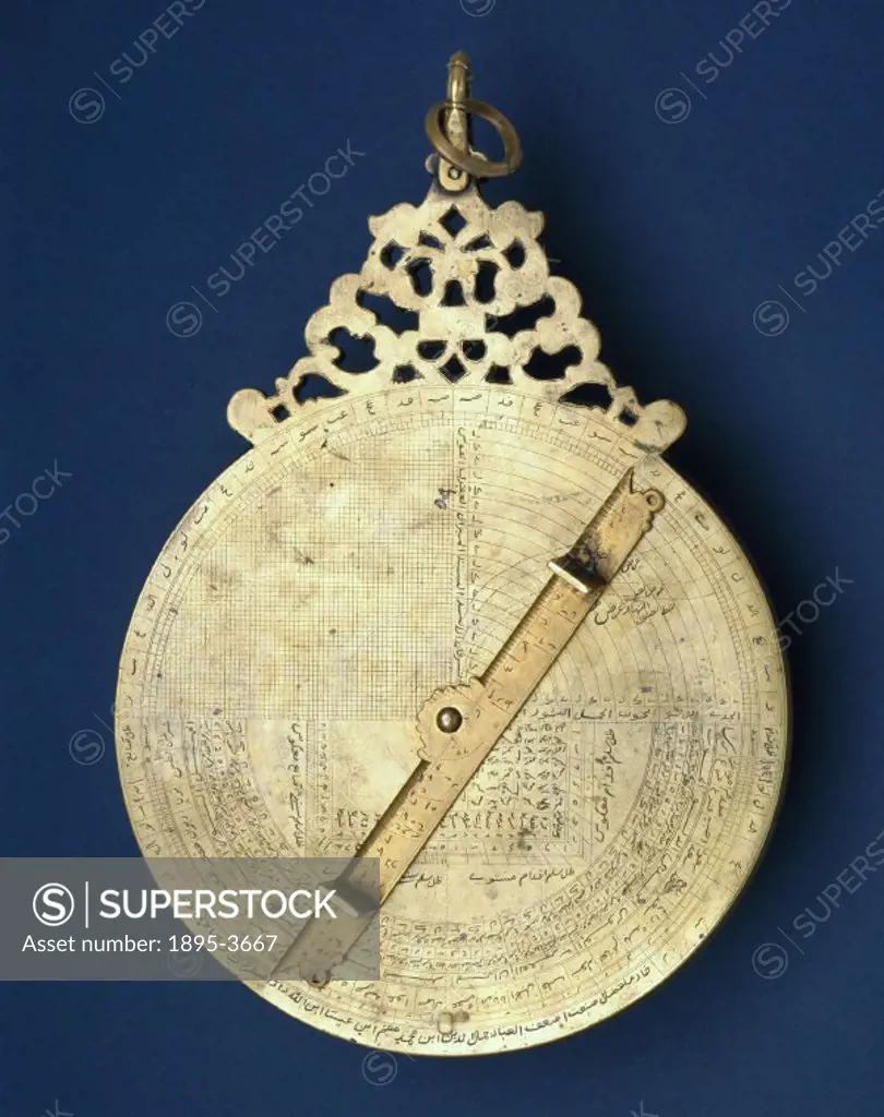This brass Islamic astrolabe was made by Jamal al-Din at Lahore, Pakistan. An astrolabe is in essence a model of the universe that an astronomer could...