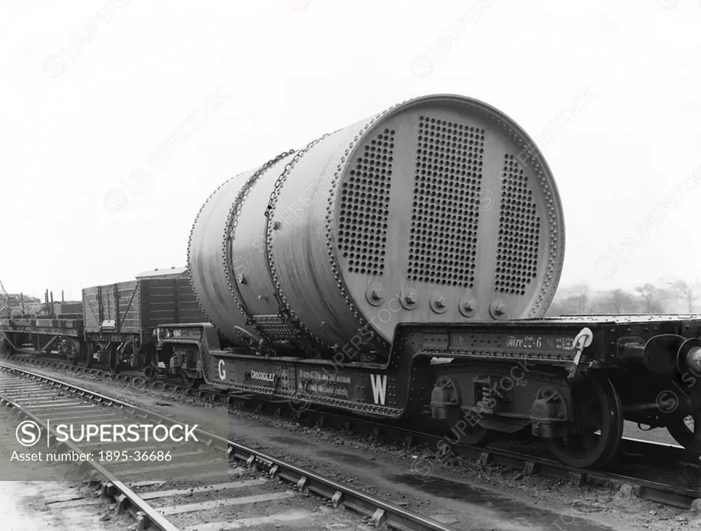 Large load at St Pancras Station, London, c 1939.Heavy load on a Great Western Railway ´Crocodile´ wagon at St Pancras station. The wagon is capable o...