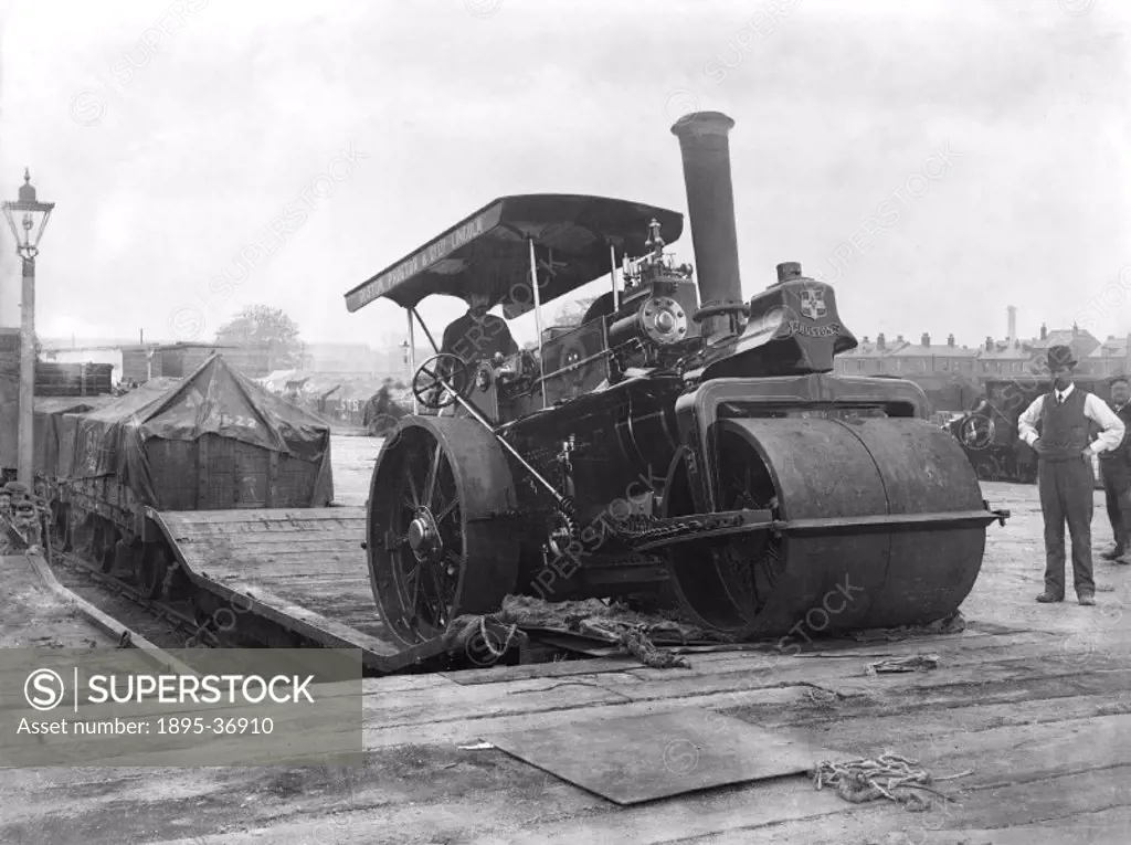 Steam roller being unloaded from a train at Derby station, June 1906. The equipment is being exhibited at the Royal Agricultural show.  The Royal Agri...