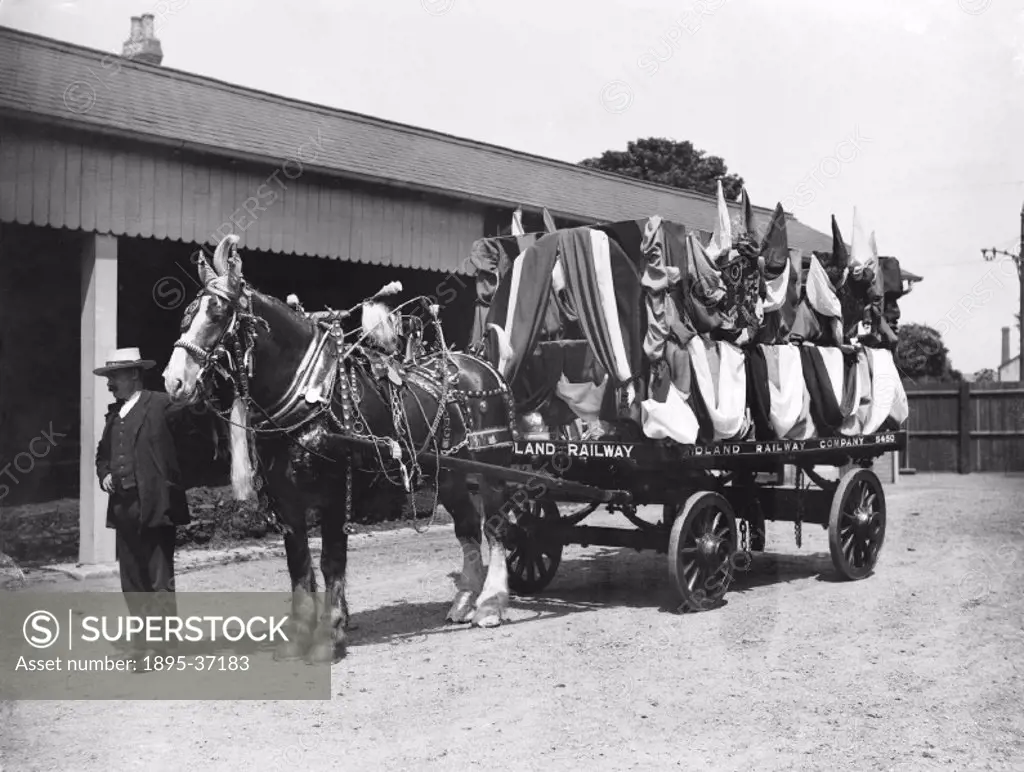 Midland Railway horse pulling a dray, Ockbrook, Derbyshire, 22 June 1912. The dray is decorated for the Ockbrook cycle parade.  These vehicles collect...