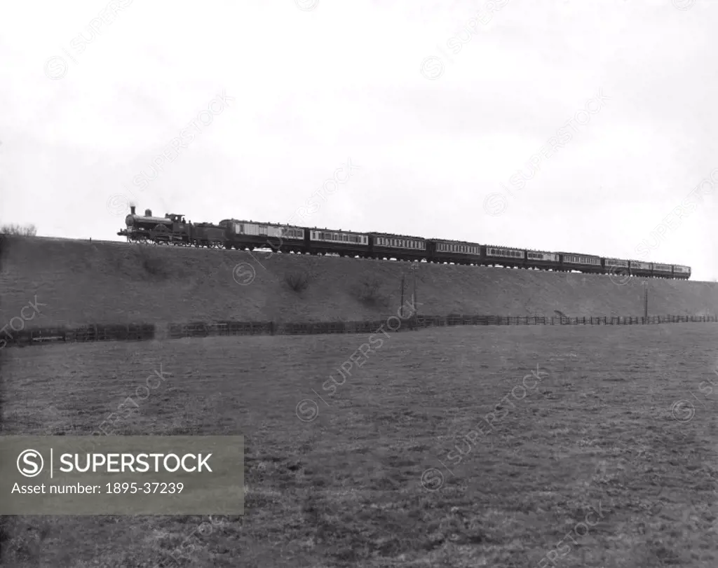 A Teutonic class 2-4-0 locomotive number 1304 ´Jeanie Deans´ with a passenger train at Boxmoor, Hertfordshire, en route from London to Glasgow, 28 Mar...