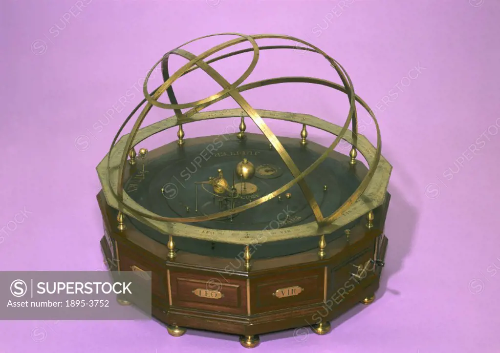 This large planetary model is thought to have been made by the London instrument maker Thomas Wright. Known as an orrery or planetarium, it is a demon...