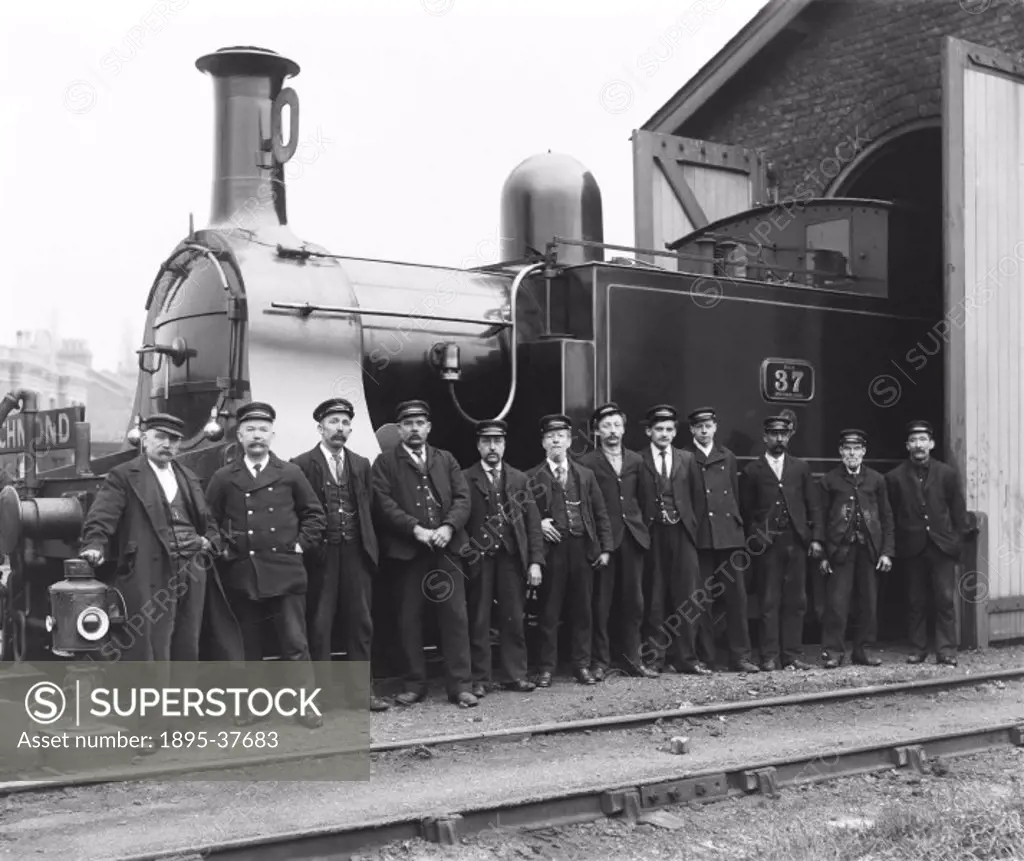 Workers around locomotive number 37, about 1900. This locomotive was manufactured at Bow works.  The workers at Bow works usually started work at age ...