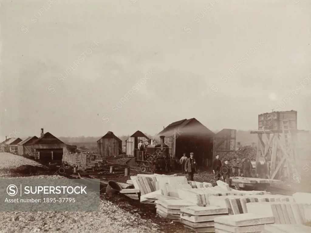 Building materials and temporary huts during the construction of the Harrow to Uxbridge railway line, by R Wells, about 1902.   This line, owned by th...