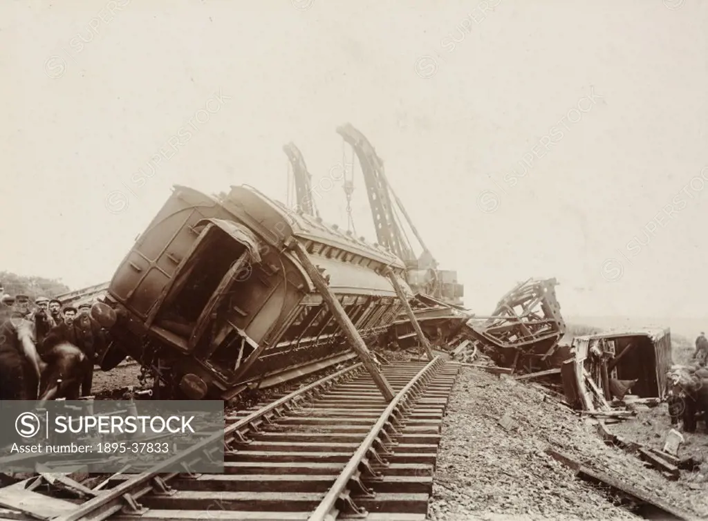 Derailed train at Loughor Bridge, near Llanelli, 1904.   This Great Western Railway passenger train derailed because it was travelling too fast down a...