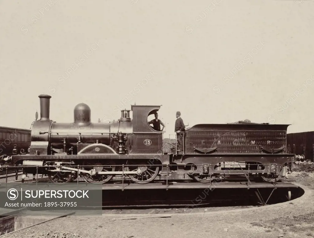 2-2-2 locomotive number 13 on a turntable, about 1860. This locomotive was owned by the Eastern & Midland Railway.  Turntables were used to transfer l...