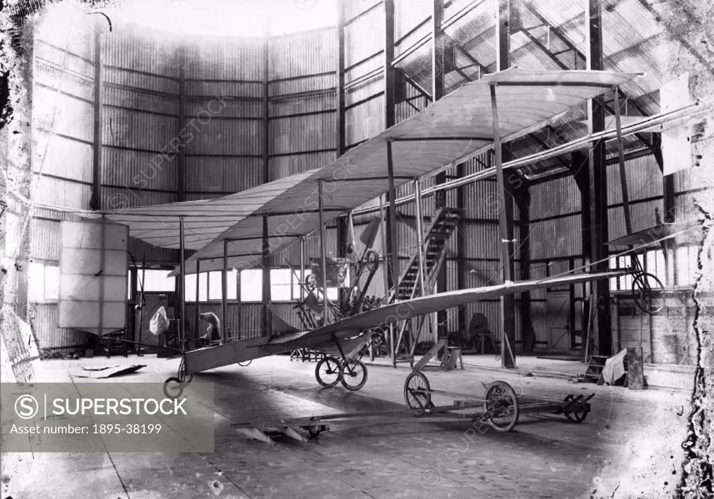 Cody Aeroplane No1, Antoinette engine being fitted, transport trolley in foreground. Taken in the Farnborough airship shed. Samuel Franklin Cody (1861...