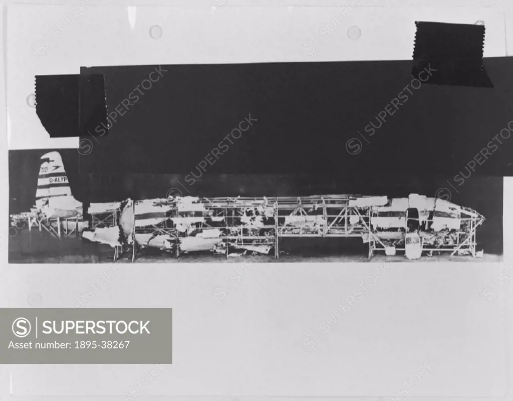 The recovered portions of the de Havilland Comet G-ALYP  arranged on an armature for analysis at the Royal Aircraft Establishment (RAE) at Farnborough...