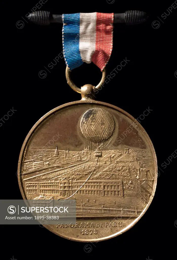 Souvenir medal showing Giffard´s captive balloon above a view of Paris.