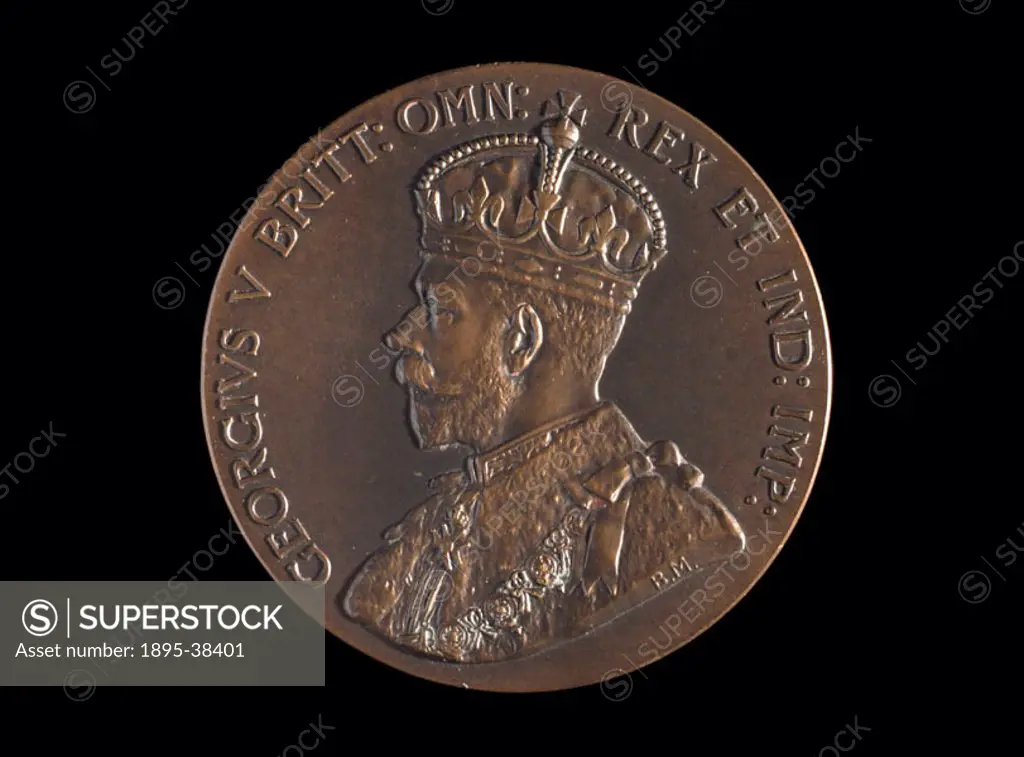 Medal awarded to Ludwig and Henry Oertling for their chemical balances, showing a portrait of King George V.