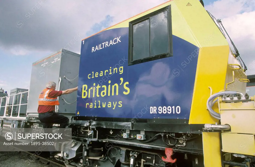 Weed killing vehicle number DR98910 at Doncaster, by Lynn Patrick. This vehicle cleans the East Coast Main Line. It clears leaves from the track in th...