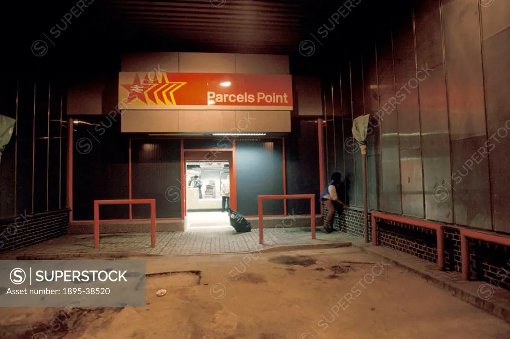 Red Star parcel depot, by Chris Hogg, 1995. Red Star is a parcel delivery service, that is run by the railways. The service offers next day delivery f...