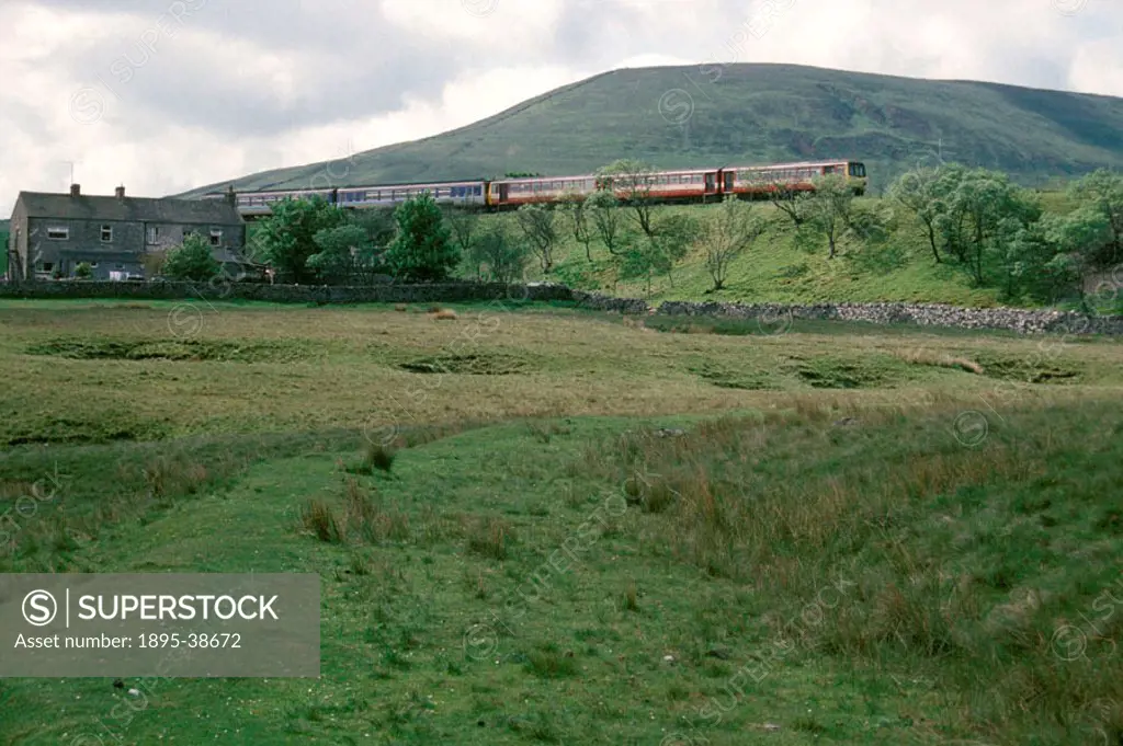 Diesel powered passenger train at Blea Moor, North Yorkshire, by Chris Hogg, 1994. Blea Moor is on the Settle to Carlisle Railway line, between Blea M...