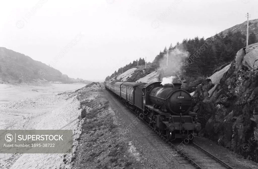 Passenger train, pulled by a K1 class 2-6-0 locomotive number 62034 on the West Highland Railway, by Eric Treacy, about 1955.  The West Highland line ...