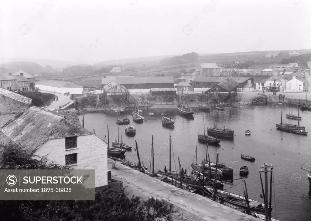 Harbour in the village of Porthleven, Cornwall, 1923.  This photograph was one of a series taken to advertise holidays in Cornwall, at locations serve...