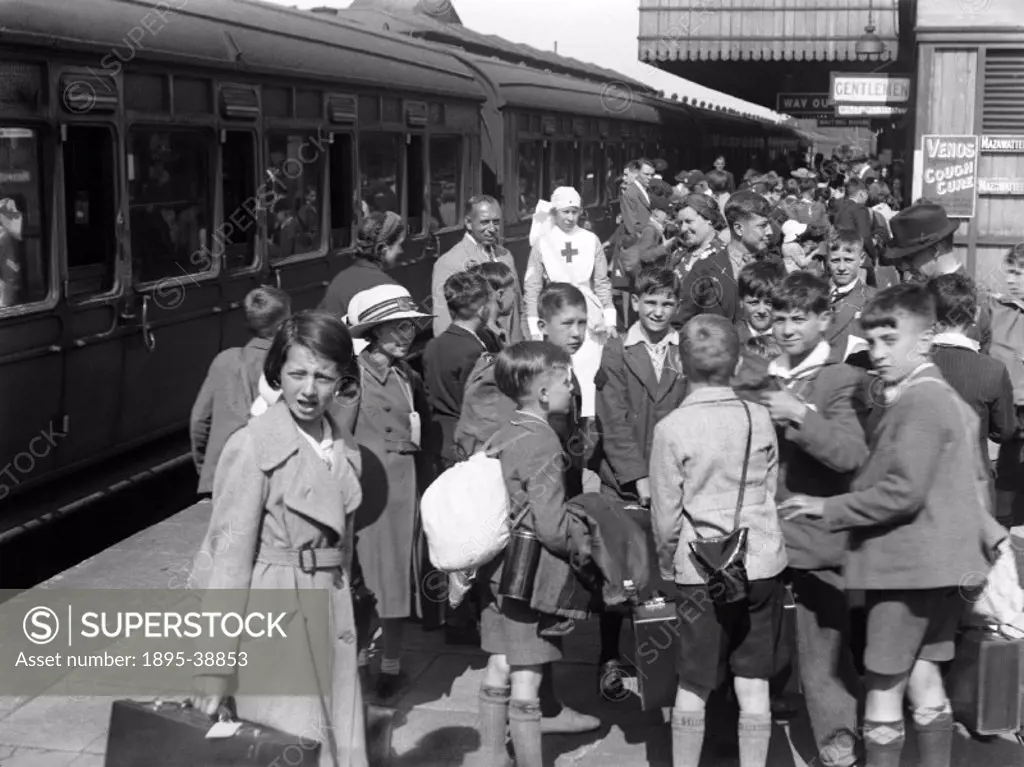 Evacuees arriving at Maidenhead station, Berkshire, 1940.  At the start of the Second World War thousands of children and adults were evacuated from L...