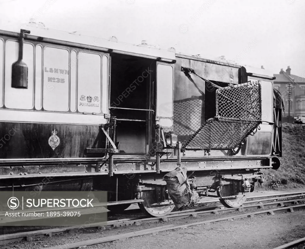 A London & North Western Railway Post office carriage, 1908.  Post office trains had been used since the coming of the railways. Letters were hung fro...