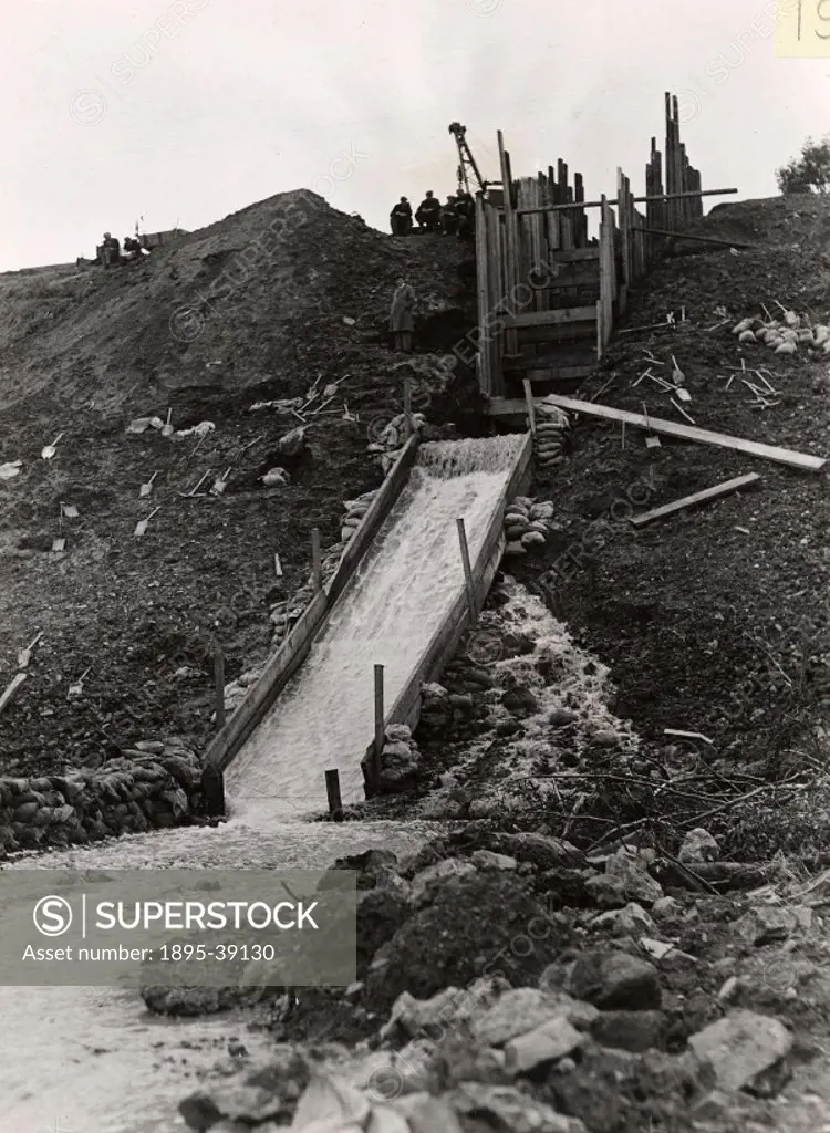Railway bridge being rebuilt in the Scottish Borders, 1948. The bridge had been damaged by flood water, and needed repairing.   This area of Scotland ...