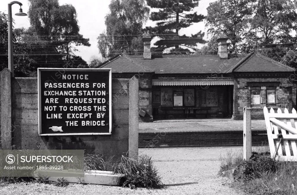 Notice at Wrexham Exhange station, Denbighshire, by Selwyn Pearce-Higgins, 1971.  This station opened in 1887 on the Wrexham, Mold and Connah´s Quay R...