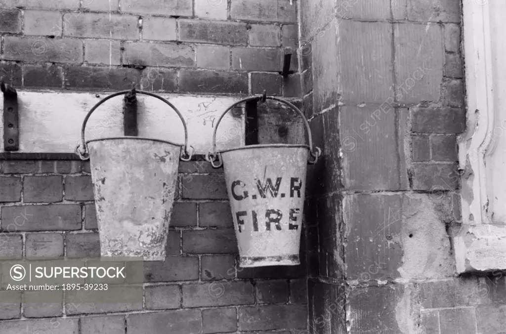Great Western Railway fire buckets at a derelict railway station, by Selwyn Pearce-Higgins, 1971.  Many stations closed down in the 1960s. The Beechin...