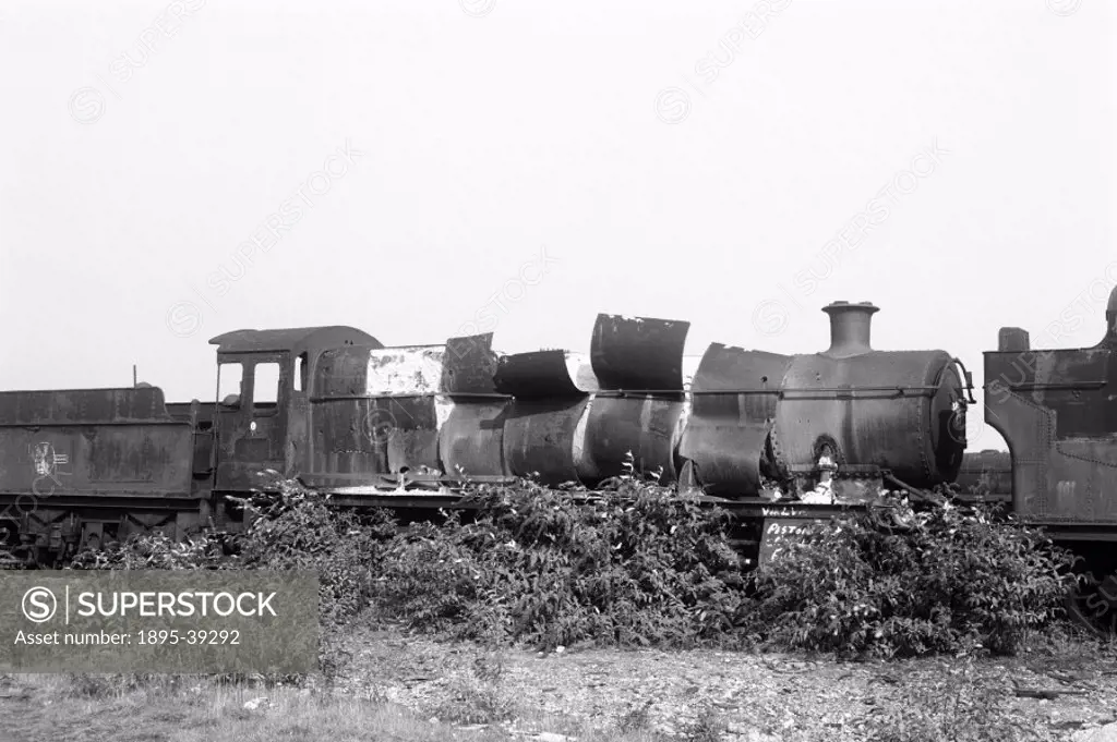 Locomotive in a scrap yard, by Selwyn Pearce-Higgins, 1978.  Steam locomotives were withdrawn from British Railways in 1968. Some locomotives were pre...