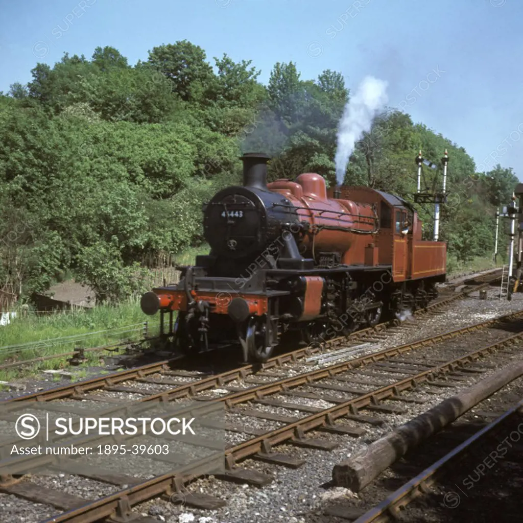 A class 5 4-6-0 locomotive number 45443 on the Severn Valley Railway, by Eric Treacy, about 1974.  The Severn Valley Railway was built in 1862, betwee...